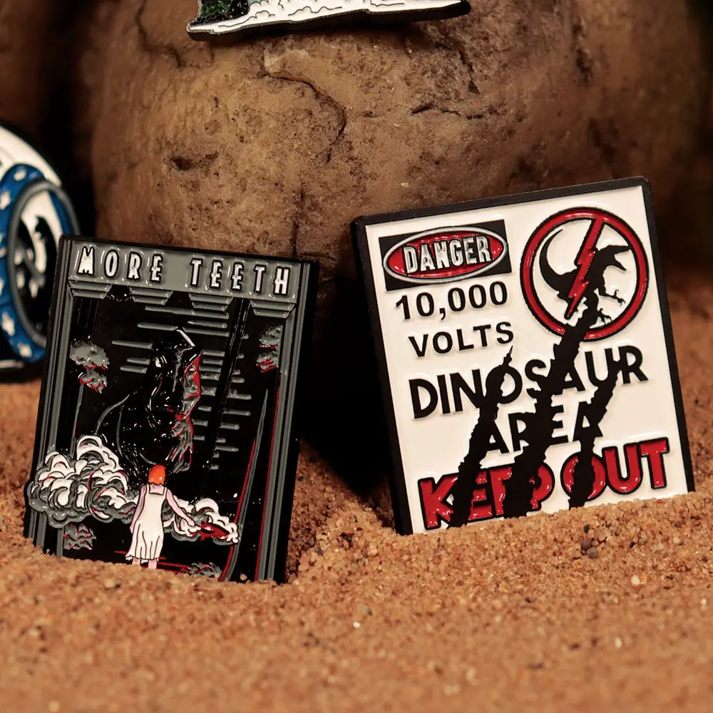 Jurassic Park & Jurassic World Mystery Pin Badge CDU Containing 12 Blind Boxes