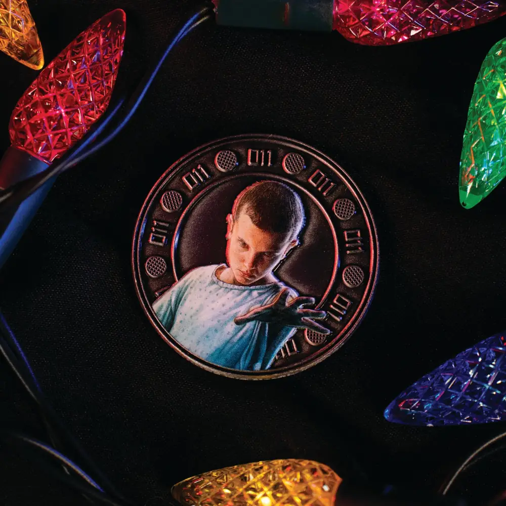 Stranger Things Eleven and Hopper Coin
